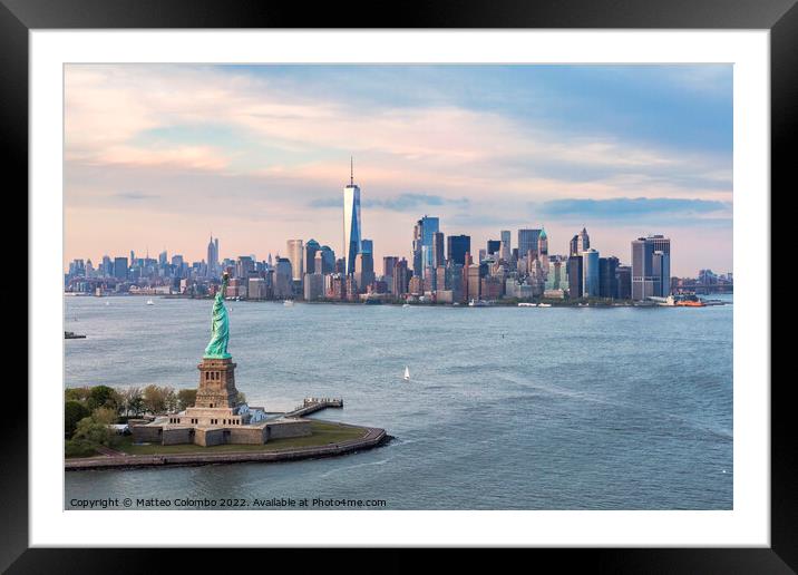 Aerial of the Statue of Liberty and Manhattan skyline, New York, Framed Mounted Print by Matteo Colombo