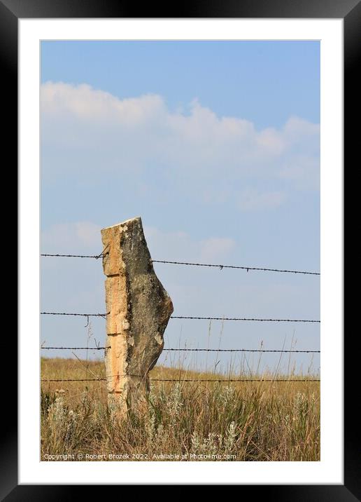 Stone Post fence with a field and blue sky Framed Mounted Print by Robert Brozek