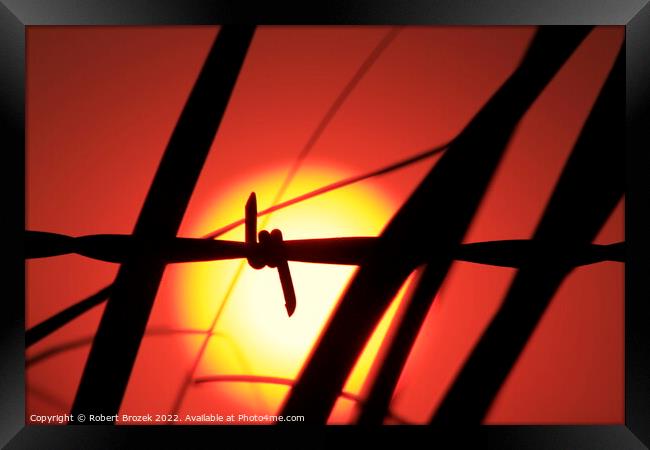 Abstract Sunset with fence Framed Print by Robert Brozek
