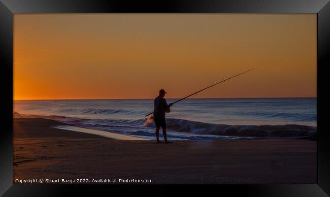 Lone Angler at Sunrise  Framed Print by Stuart Bazga