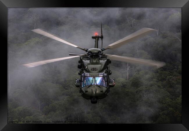 Helicopter low level above the jungle  Framed Print by Bart Rosselle