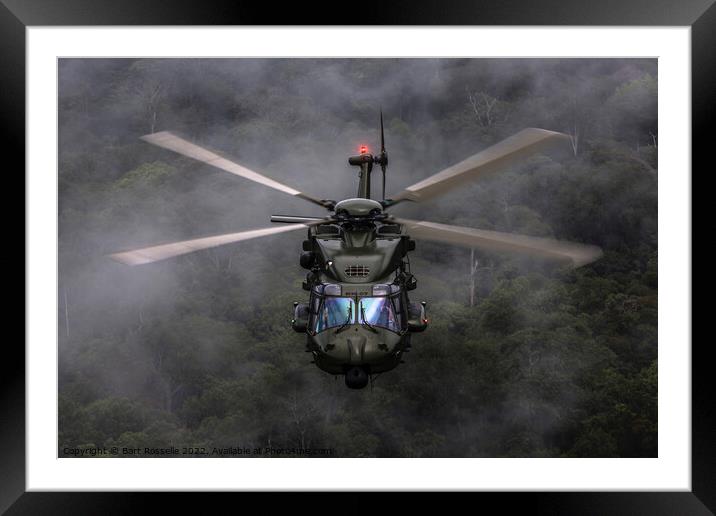 Helicopter low level above the jungle  Framed Mounted Print by Bart Rosselle