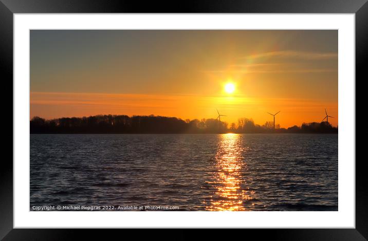 Beautiful and romantic sunset at a lake in yellow and orange col Framed Mounted Print by Michael Piepgras