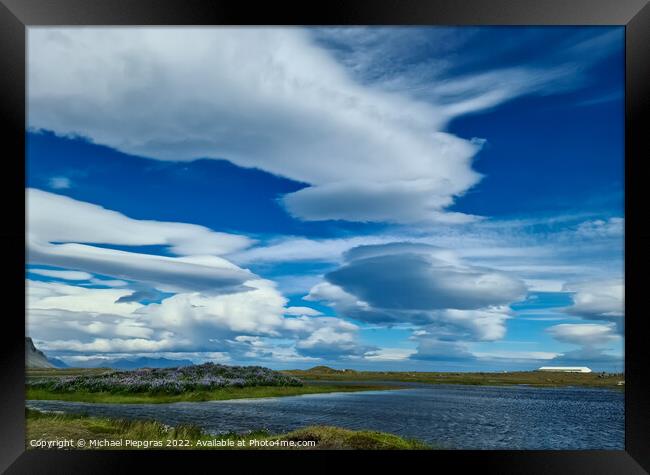 Spectacular UFO clouds in the sky over Iceland - Altocumulus Len Framed Print by Michael Piepgras