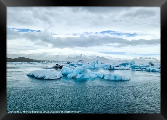 Iceland, Jokulsarlon Lagoon, Turquoise icebergs floating in Glac Framed Print by Michael Piepgras