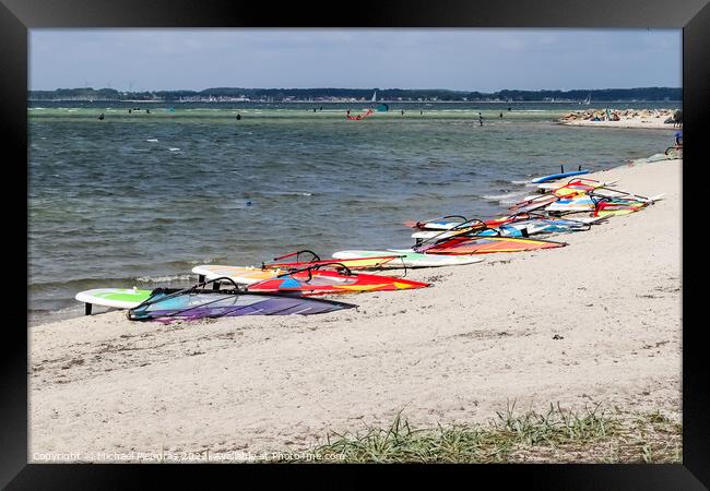 Lots of kite surfing activity at the Baltic Sea beach of Laboe i Framed Print by Michael Piepgras