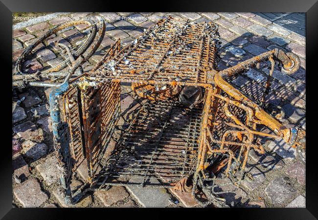 Rusty and damaged shopping cart found in the port of Kiel in Ger Framed Print by Michael Piepgras