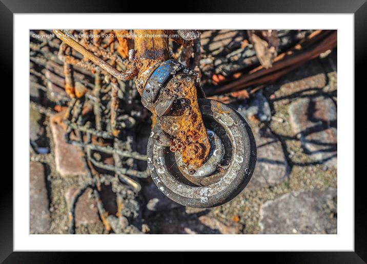 Rusty and damaged shopping cart found in the port of Kiel in Ger Framed Mounted Print by Michael Piepgras