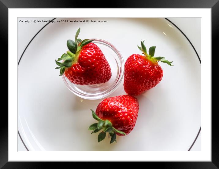 Strawberries with leaves on a plate in a glas bowl. Isolated on  Framed Mounted Print by Michael Piepgras