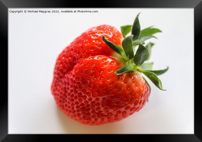 Strawberries with leaves on a plate in a glas bowl. Isolated on  Framed Print by Michael Piepgras