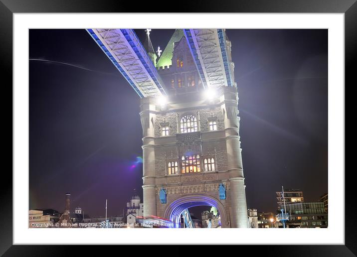 The Tower Bridge in London at night with colorful lights Framed Mounted Print by Michael Piepgras