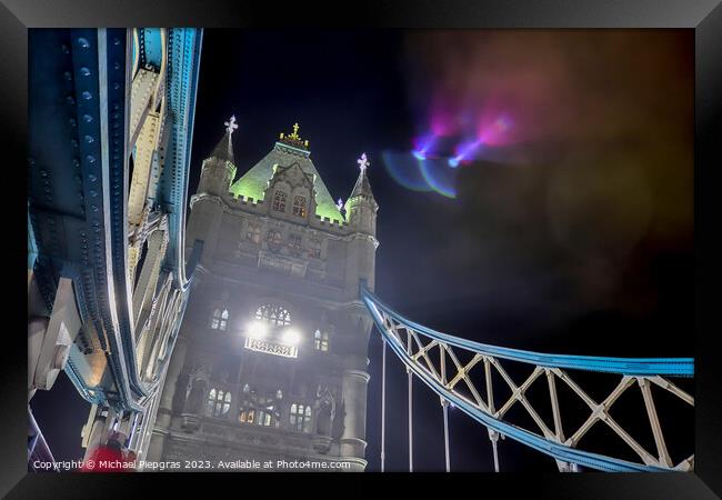 The Tower Bridge in London at night with colorful lights Framed Print by Michael Piepgras