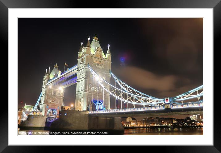 The Tower Bridge in London at night with colorful lights Framed Mounted Print by Michael Piepgras