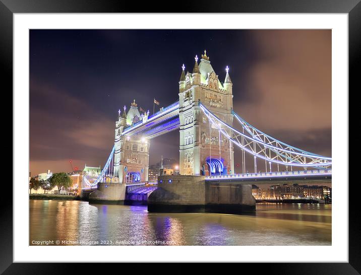 The Tower Bridge in London at night with colorful lights Framed Mounted Print by Michael Piepgras