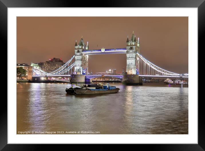 The Tower Bridge in London at night with colorful lights Framed Mounted Print by Michael Piepgras