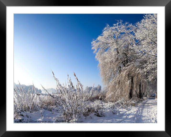 Beautiful winter shot at a lake and forest with snow and ice. Framed Mounted Print by Michael Piepgras