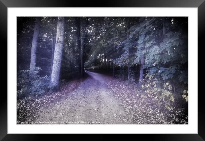 Mysterious fairy tale view into a magical dark blue forest with a soft bokeh and strong light beams Framed Mounted Print by Michael Piepgras