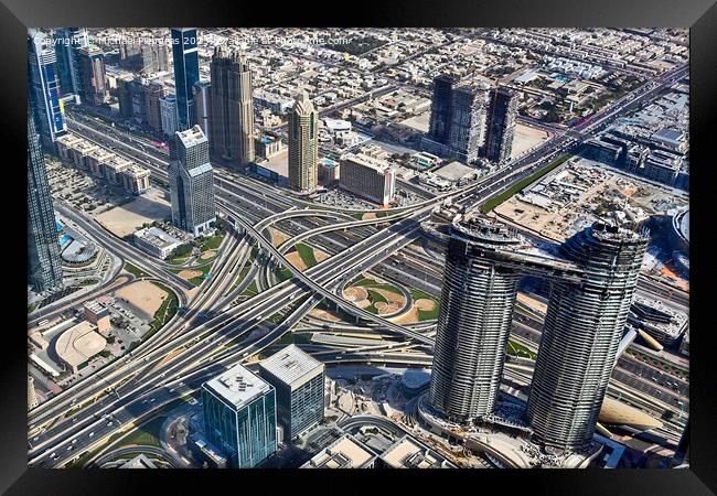 Aerial view over the city center of dubai on a sunny day Framed Print by Michael Piepgras