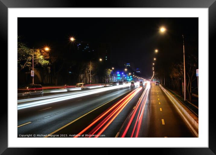 Traces of light in traffic created with generative AI technology Framed Mounted Print by Michael Piepgras