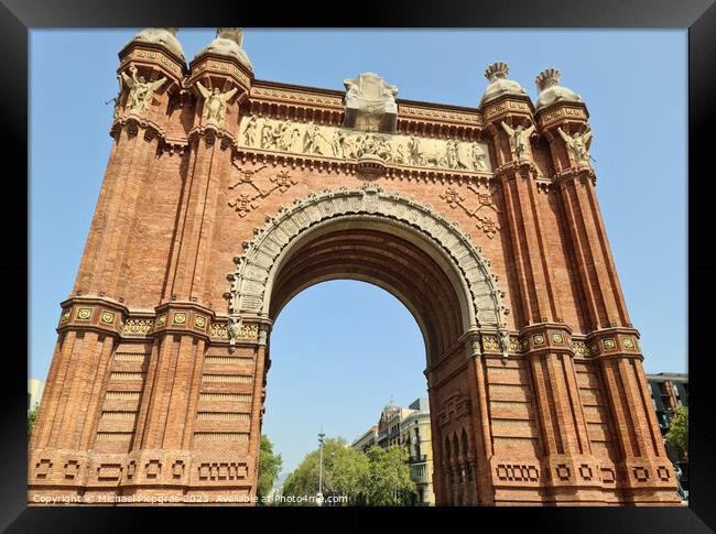 Barcelona, Spain - 22 July 2023: The Arc de Triomf in Barcelona on a sunny day with some tourists Framed Print by Michael Piepgras