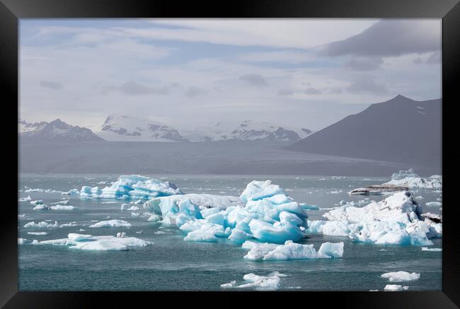 Iceland, Jokulsarlon Lagoon, Turquoise icebergs floating in Glac Framed Print by Michael Piepgras