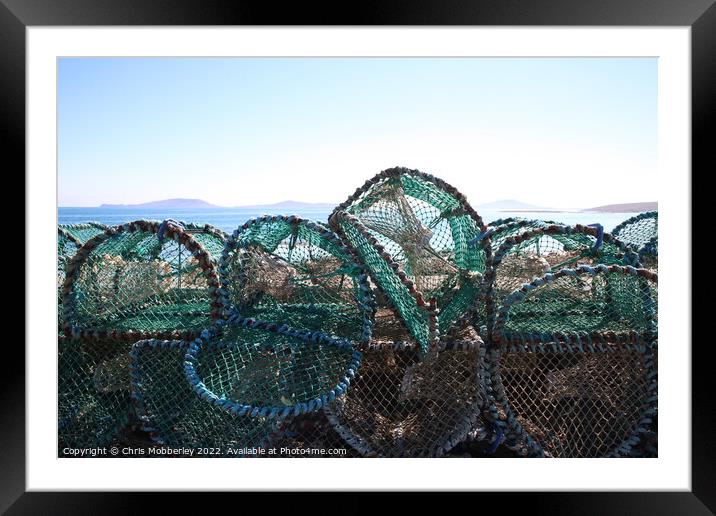 Lobster pots Framed Mounted Print by Chris Mobberley