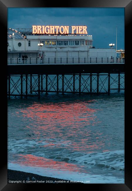 Brighton Pier at night neon light Framed Print by Samuel Foster