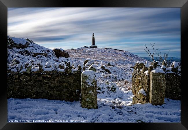Snow Covered Monument Framed Print by Mark Bowman