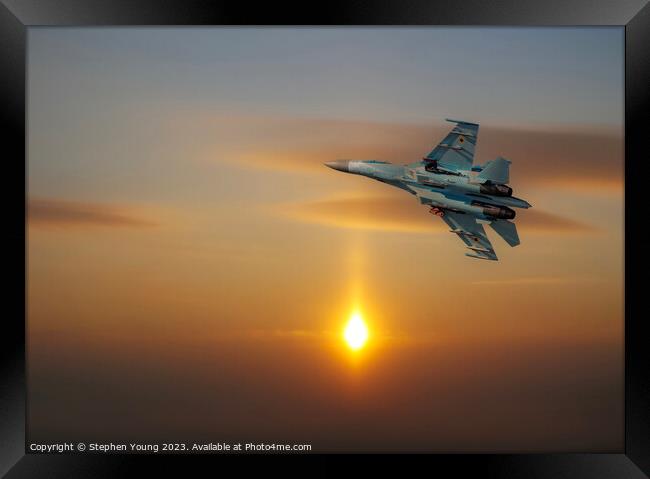 Ukrainian SU-27 Flanker into the Sunset Framed Print by Stephen Young