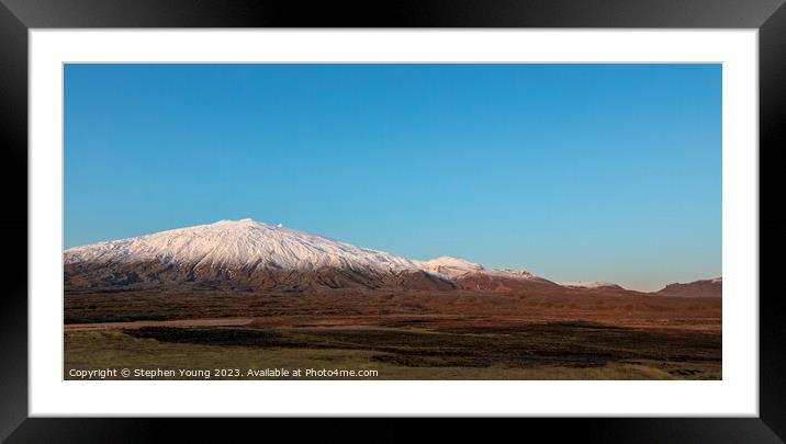 Solitude in Snow: Iceland's Minimalist Mountain Landscape Framed Mounted Print by Stephen Young