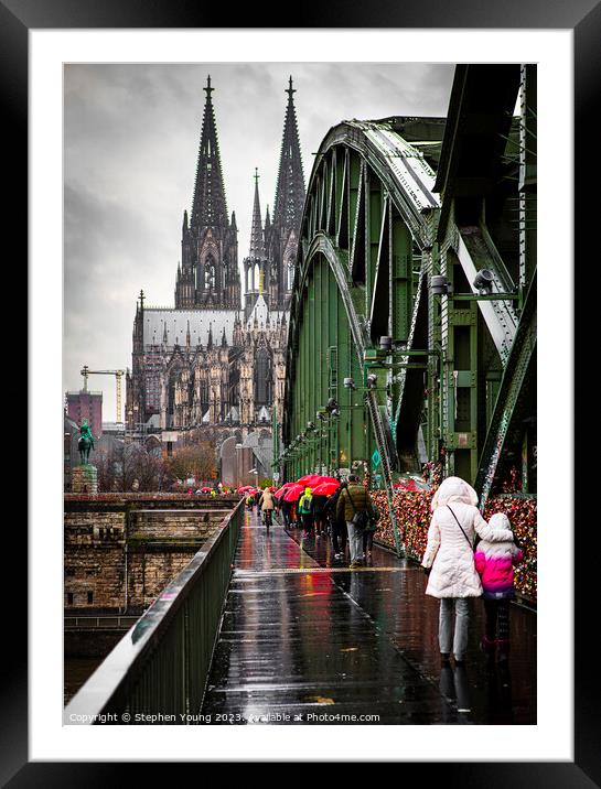 Rainy Day Crossing the Hohenzollern Bridge, Cologne, Germany Framed Mounted Print by Stephen Young