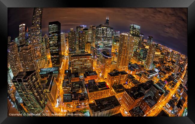 Aerial wide angle night view illuminated Chicago skyline  Framed Print by Spotmatik 