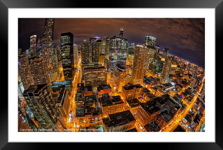 Aerial wide angle night view illuminated Chicago skyline  Framed Mounted Print by Spotmatik 