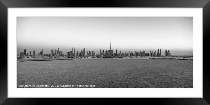 Aerial Panoramic sunset of Dubai city skyscrapers Framed Mounted Print by Spotmatik 