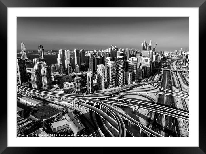Aerial Dubai city skyscrapers highway interchange Framed Mounted Print by Spotmatik 