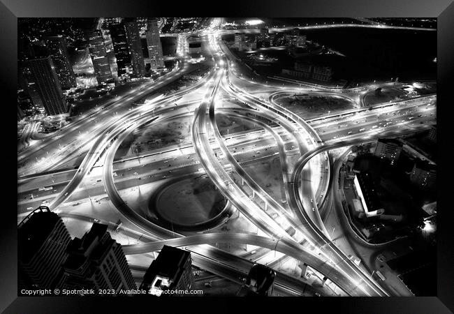 Aerial night Dubai Intersection Sheikh Zayed Road  Framed Print by Spotmatik 