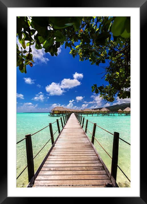 Bora Bora walkway across lagoon luxury Overwater bungalows  Framed Mounted Print by Spotmatik 