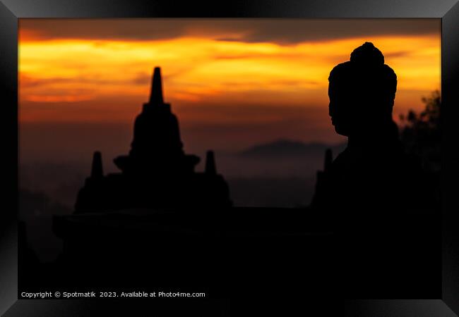 Silhouette at sunrise of Borobudur religious temple Indonesia  Framed Print by Spotmatik 