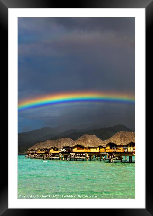 Rainbow arch over Bora Bora luxury Overwater bungalows  Framed Mounted Print by Spotmatik 