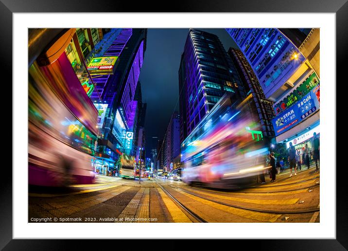 Hong Kong illuminated busy street intersection Kow Framed Mounted Print by Spotmatik 