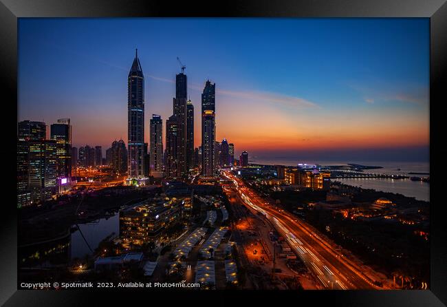 Dubai sunset Sheikh Zayed Road Media city skyscrapers  Framed Print by Spotmatik 