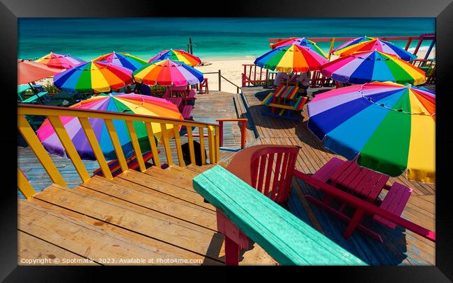 Umbrellas in the sun tropical beach Bahamas Caribbean Framed Print by Spotmatik 