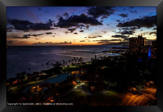 Waikiki sunset illuminated view at dusk Pacific ocean Framed Print by Spotmatik 