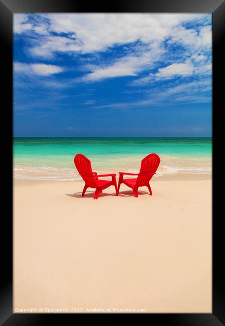 Tranquil holiday destination with red chairs on beach Framed Print by Spotmatik 