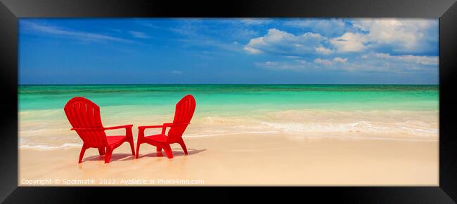 Panoramic red travel chairs on white sandy beach Framed Print by Spotmatik 