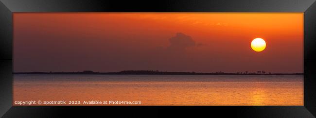 Panoramic ocean view at sunset with orange sky Framed Print by Spotmatik 