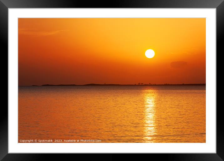 Caribbean island seascape with sunset sky Framed Mounted Print by Spotmatik 