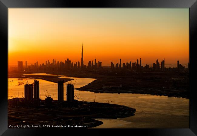 Aerial Dubai sunset a famous travel tourism destination  Framed Print by Spotmatik 