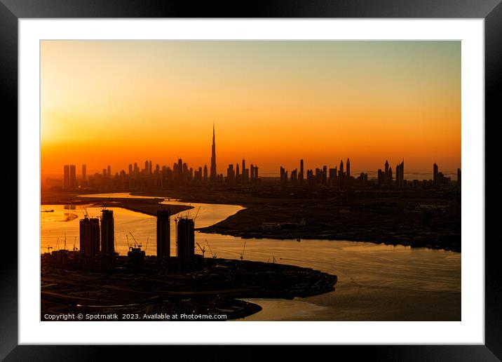 Aerial Dubai sunset a famous travel tourism destination  Framed Mounted Print by Spotmatik 