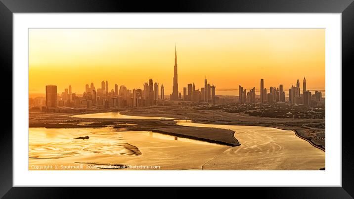 Aerial sunset view of Dubai city skyscrapers UAE Framed Mounted Print by Spotmatik 